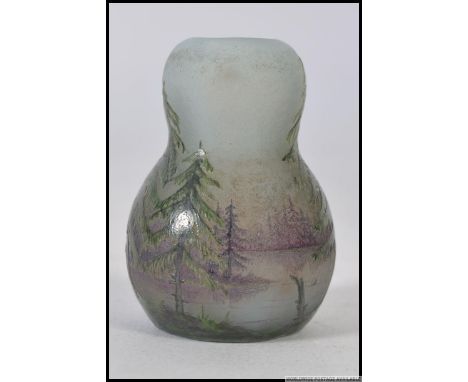 A stunning miniature enamelled glass vase being hand painted with furn trees and lake scene being acid etched to the base  ' 