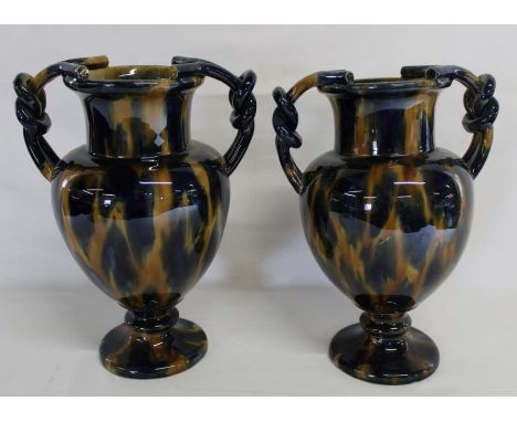 Pair of 2 handled ceramic vases with Whieldon style decoration. 33cm high (one cracked)