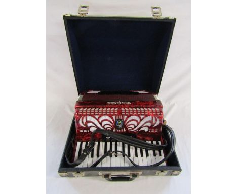 Red Galotta accordion 34 keys,&nbsp; 72 bass buttons, 3 bass register switches and 5 treble register switches with fretwork g