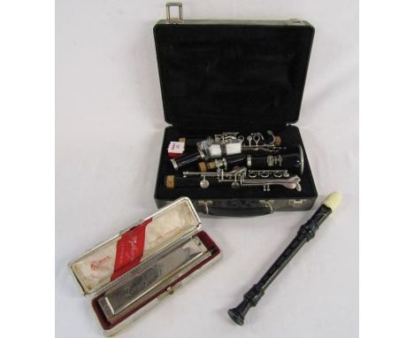Dolmetsch recorder, Hohner KLarry Adler harmonica and a Bundy resonite clarinet by The Selmer Company U.S.A in a Bundy hard c