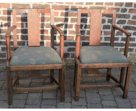 SIR FRANK BRANGWYN (1867-1956) Pair of Art & Crafts oak open arm dining chairs, from the Salle Jacques Cartier dining room (b