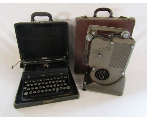 Cased Royal typewriter and Specto projector