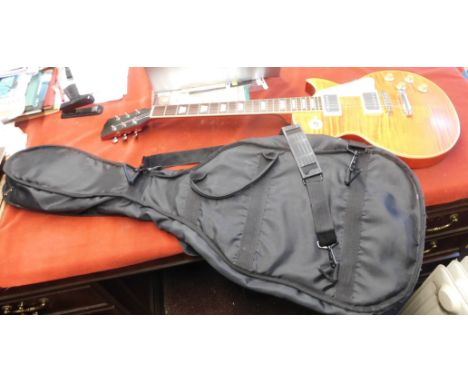 Electric Guitar. Vintage shape. No makers mark. Looks unused. Very good condition. With soft case