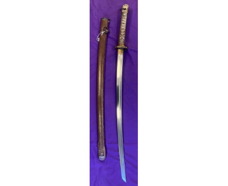 Japanese WWII Type 95 NCO Sword, mass produced machine made No. 26356, unsigned with no matching numbers on the Saya, issued 