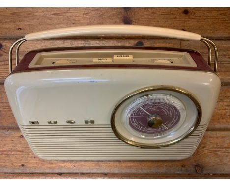 Vintage Bush Portable Radio.  A vintage Bush VTR103 portable transistor radio from the early 1960s. Two-tone cream and red ba