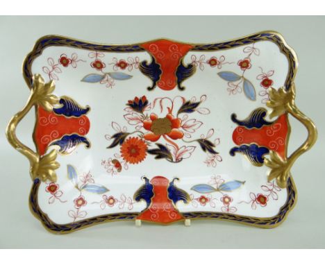 A SWANSEA PORCELAIN CENTRE DISH WITH TWIG HANDLES of footed rectangular form, handles picked out in gold, decorated in 'Imari