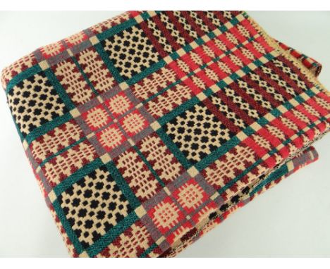 VINTAGE WELSH TAPESTRY REVERSIBLE BLANKET of geometric design, red ground with green and black detail, 215 x 182cms Provenanc