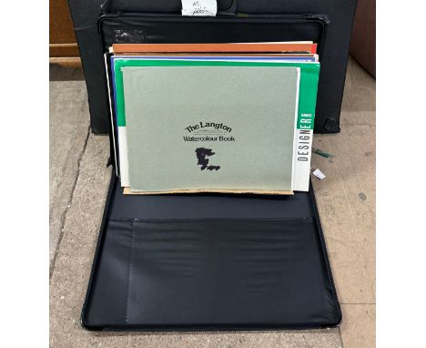 Two folios of artists A2 watercolour paper and sketch pads 