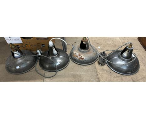 Four industrial light fittings 