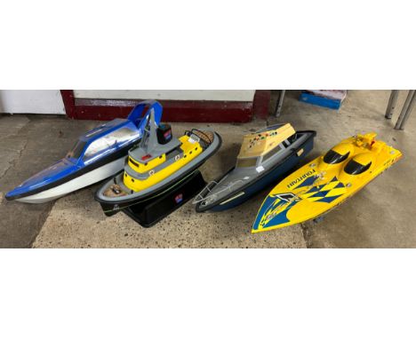 Four remote control model power boats 