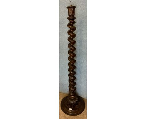 A Chinese carved hardwood lamp 