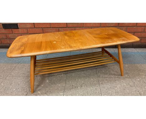 An Ercol Blonde elm and beech Windsor coffee table 