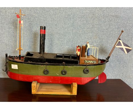 A live steam model of a Clyde Puffer cargo ship, with boiler and steam engine 56cms l 