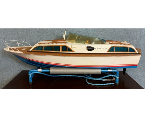 A model Huntsman 31 power boat designed for radio control, 90cms l 