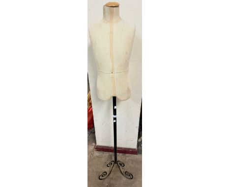 A half mannequin on stand 