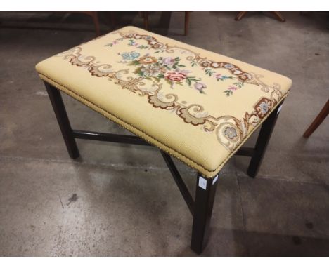 A George III style mahogany stool, with floral tapestry seat 