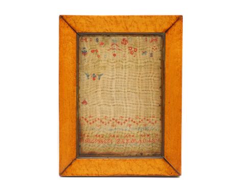 A Victorian needlework sampler, with floral and alphabet work, by Elizabeth Jenkins, aged 13, February 13 1850, all within a 