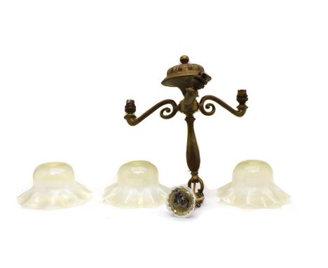 A Victorian brass ceiling light, in the manner of James Powell &amp; Sons, with three straw opalescent, shades 18.5cm wide, l