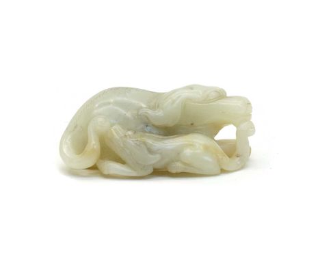 A Chinese jade carving, of a recumbent dog with a pup to side, the stone of greyish white tone, 7cm longCondition report: Fin