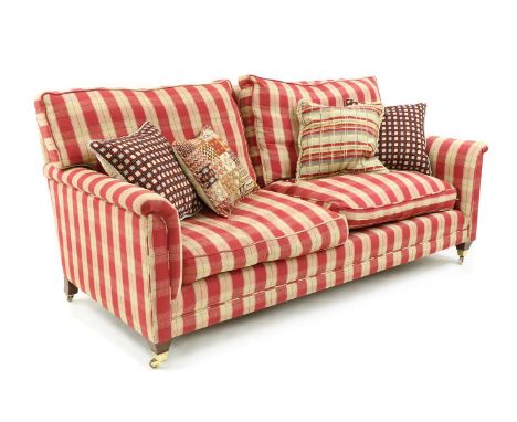 A modern two-seater sofa by Nina Campbell, upholstered in chequered red fabric, raised on tapering square supports terminatin