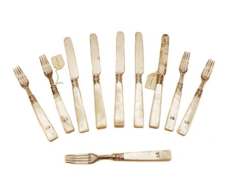 A set of eighteen early Victorian fruit knives and forks, the silver blades and forks fitted with angular mother-of-pearl han