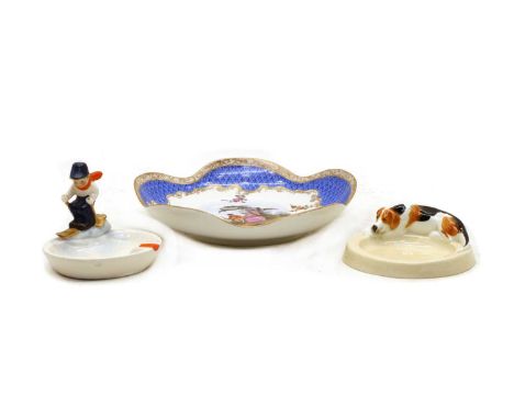 A Royal Worcester porcelain 'Hound' dish, inscribed beneath ' "Hound" modelled by Doris Lindner', with printed factory mark f
