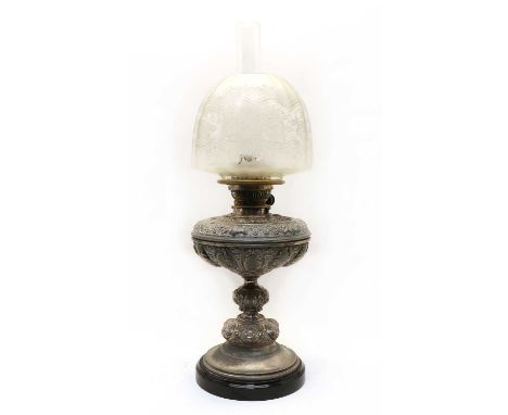 A late Victorian Hinks No. 1 Triple oil lamp, with an embossed silver plated baluster shaped body, raised on a glass foot, wi