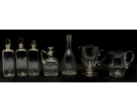 A collection of glassware, to include a 1930's lemonade jug, 21cm high, a wrythen glass bottle, 29cm high, a Roman type decan