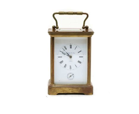 A modern brass carriage clock, the dial inscribed 'Matthew Norman London', the movement should strike the half hours on a gon