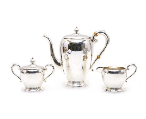 An American Preisner sterling silver three-piece coffee service, comprising coffee pot, cream jug and sucrier, all of taperin