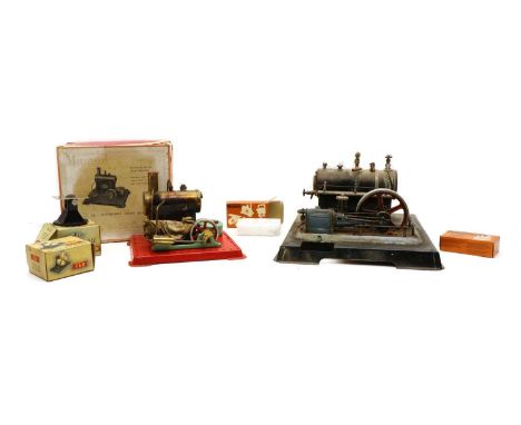 Two model stationary steam engines, the first by Mamod, with circular saw and fan and two boxes of solid fuel tablets, 18 x 2