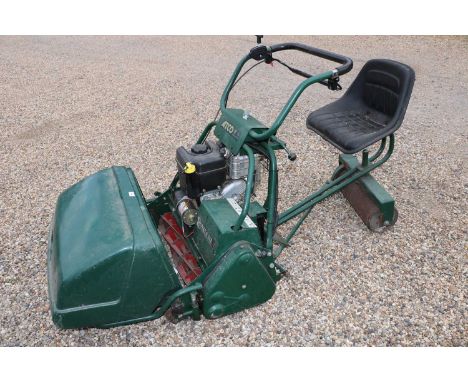 An Atco Royale 24E l/C cylinder mower and ride on attachment with Briggs and Stratton Intek Pro 206 OHV engine, with 12 inch 