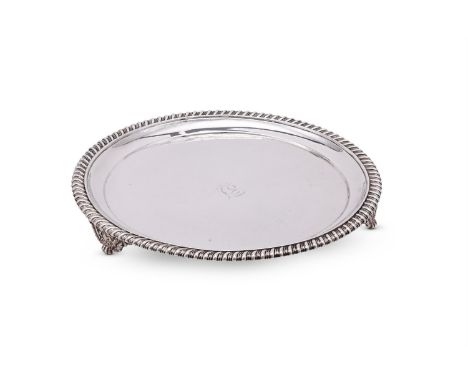 
	
		A WILLIAM IV SILVER CIRCULAR SALVER
		THOMAS WHATLEY, NEWCASTLE 1837
		With a gadrooned border, engraved J and on three 