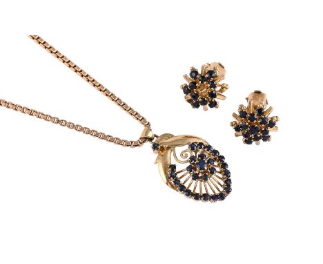 
	
		A SAPPHIRE PENDANT ON CHAIN WITH A PAIR OF SIMILAR SAPPHIRE EARRINGS
		The oval pierced panel with a border of circular 