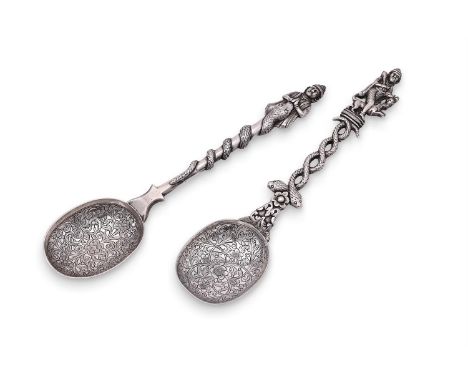 
	
		AN INDIAN SILVER SPOON
		STAMPED O.M, PROBABLY OOMERSI MAWJI, LATE 19TH CENTURY
		The terminal in the form of a figure h
