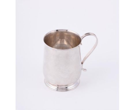 
	
		A GEORGE II SILVER BALUSTER MUG
		LONDON CIRCA 1750
		With a scroll handle, engraved DK beneath and on a circular moulde