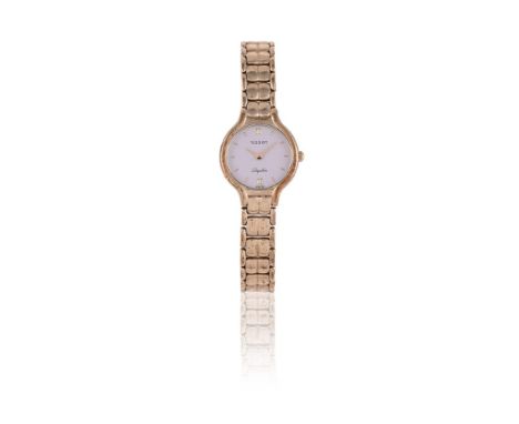 
	
		TISSOT 
		A LADY'S 9 CARAT GOLD BRACELET WATCH, NO. G706310
		Movement: Cal. ETA 967.001, quartz 6 jewels
		Case: 9 cara