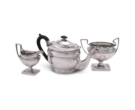 
	
		A GEORGE III SILVER OVAL BALUSTER TEA POT
		JOHN EMES, LONDON 1802
		With a lobed oval wood finial and loop handle, engr