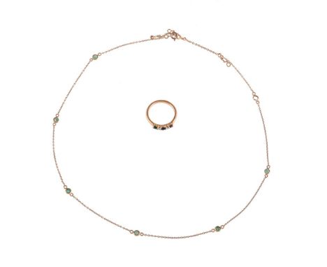 
	
		A FRENCH MULTI GEM SET RING AND AN EMERALD CHAIN NECKLACE
		The ring with a circular cut ruby, sapphire and emerald, int