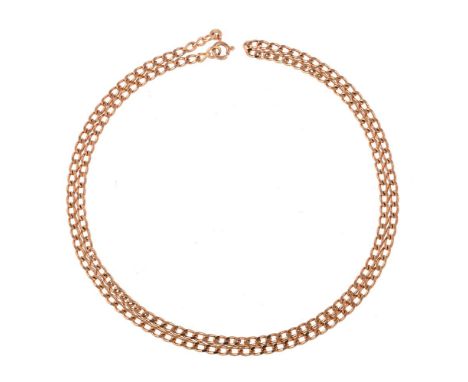
	
		AN 18 CARAT GOLD CURB LINK NECKLACE 
		LONDON 1974 IMPORT MARK
		The flattened curb link chain necklace to a ring bolt c