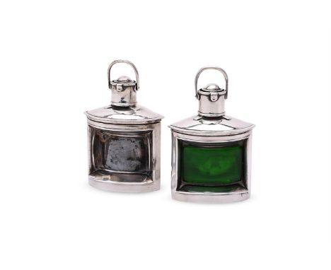 
	
		A MATCHED PAIR OF SILVER 'SHIP LANTERN' INK WELLS
		LAWRENCE EMANUEL, BIRMINGHAM 1896 AND 1897
		With swing handles to t