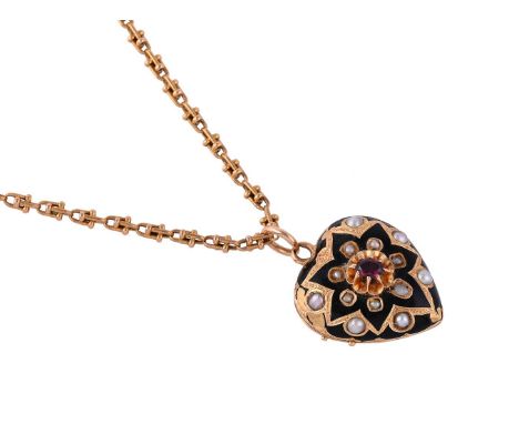 
	
		A CONTINENTAL EARLY 20TH CENTURY HEART SHAPED PEARL AND GARNET SET LOCKET ON FANCY LINK CHAIN
		The heart shaped locket 