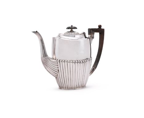 
	
		A SILVER OVAL HOT WATER POT
		W. W. HARRISON &amp; CO., SHEFFIELD 1932
		The half lobed body with an oval lobed wood fin