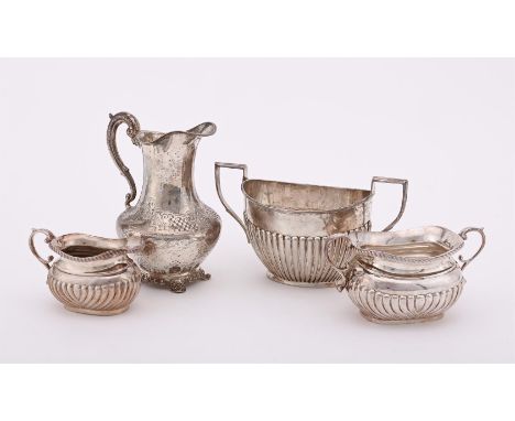 
	
		A COLLECTION OF SILVER ITEMS
		To include: a Victorian silver cream jug by William Cooper, London 1851, with a scroll ha
