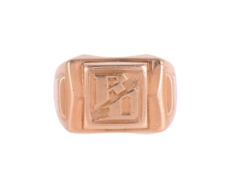 
	
		A 1940S GOLD COLOURED SIGNET RING
		The squared panel with the initials RD, within a shaped  geometric surround
		Size/d