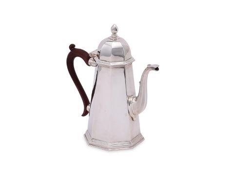 
	
		A SILVER OCTAGONAL TAPERING COFFEE POT
		WILLIAM COMYNS &amp; SONS LTD., LONDON 1971
		With a cone finial to the domed c