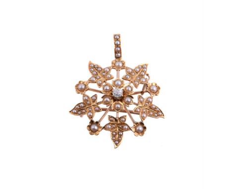 
	
		AN EDWARDIAN HALF PEARL AND DIAMOND PENDANT 
		CIRCA 1910
		The central old cut diamond within a cluster surround of hal