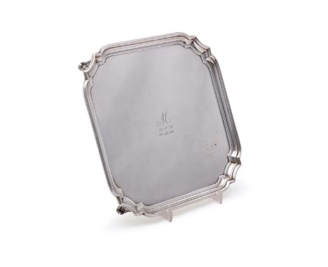 
	
		A SILVER SHAPED SQUARE SALVER
		WILLIAM HUTTON &amp; SONS LTD., SHEFFIELD 1934
		With a raised moulded border, engraved 