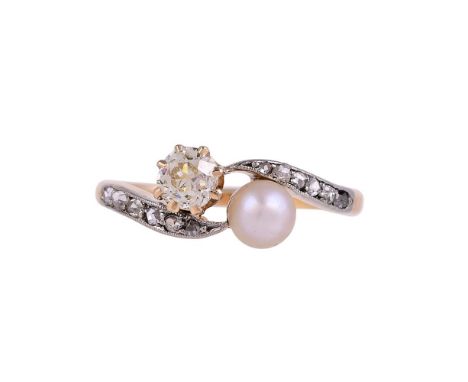
	
		A DIAMOND AND PEARL TOI ET MOI RING
		The crossover setting with a cushion cut diamond, estimated to weight 0.37 carats,