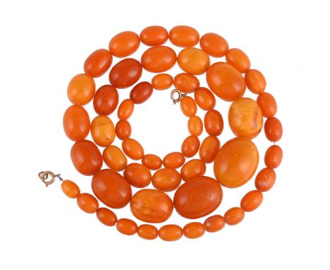
	
		A GRADUATED AMBER NECKLACE
		The graduated oval amber beads to a pair of ring bolt clasps
		Size/dimensions: beads 1.3cm